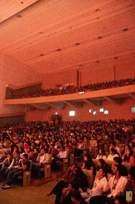 Full auditorium, including the balcony, watching the comedy night